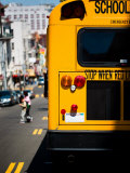 Rear View of School Bus Driving Along Street in San Francisco  California