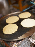 Traditional Tortillas Cooking on Griddle