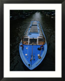 Blue Canal Tour Boat on Canal  Amsterdam  North Holland  Netherlands