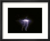 Twin Lightening Forks Slam into a Salt Pan Illuminating the Desert