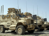Mine Resistant Ambush Protected Vehicles Sit in the Parking Area at Joint Base Balad  Iraq