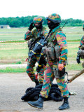 Soldiers of the Special Forces Group and a Sniper of the Belgian Army