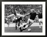 Bobby Moore of West Ham is Tripped by Tottenham Hotspur Forward Jimmy Greaves