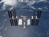 International Space Station Backdropped by a Blue and White Earth