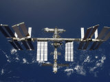 International Space Station  Backdropped by a Blue and White Earth