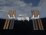 International Space Station  Backdropped by the Blackness of Space and Earth's Horizon