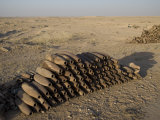 Inert Artillery Shells are Stacked Up for Collection