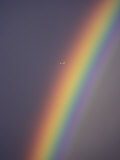 Rainbow and Airplane in a Clear Sky  West Canada