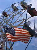 Flag in Front of a Ferris Wheel Against a Summer Sky  New London  Connecticut  USA