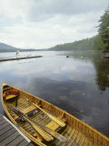 Canoe Floats Next to a Dock  Sebago Lake  Maine