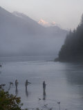 Three Fishermen Cast for Salmon in the Morning Mist  Chilkoot River  Alaska