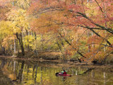 Woman Kayaking Down the Chesapeake and Ohio Canal National Park