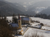 Couple with a Dog Walk Near a Hilltop Chuch  Ljubljana  Slovenia