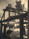 Young Woman Working at a Loom in a Workshop