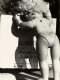 Abandoned Doll Next to a Box