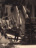Young Man with Basket on San Francesco Street in Capri