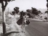 Elderly Woman on a Mule