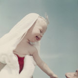 Newborn Smiling at a Man