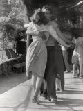 Man and a Woman Dancing in a Close Embrace