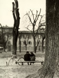 Young Couple Sitting on a Bench in Piazza Donatello in Florence