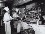 Cooks Working in the Kitchen of a Restaurant