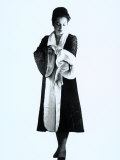 Woman in Elegant Top-Coat
