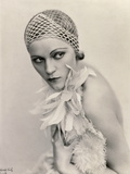 Portrait of a Woman Wearing a Fishnet Hat and a Feather Boa