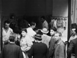 Few Clients at the Entrance of the Baraldi Fish Shop  in Via Orefici  Bologna