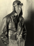 Portrait of a Motorcyclist Wearing a Leather Jacket and Helmet