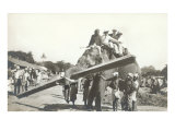 Elephant with Log and People