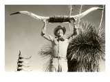 Man Holding Longhorns