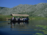 Tourists in Local Boats  Neretva Delta Valley  Croatia  Europe