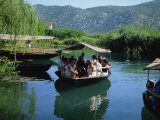 Tourists in Local Boats  Neretva Delta Valley  Croatia  Europe