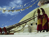 Two Monks Blowing Long Horns  Nepal