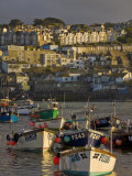 Stormy Sky at Sunset with Small Fishing Boats in the Harbour at St Ives  Cornwall  England  UK