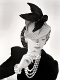 Lucille Ball Models a Unique Hat for a Publicity Still  1940's