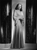 Gene Tierney Models an Apricot Wool Evening Coat with Gold  Turquoise and Crystal Trimming  1946