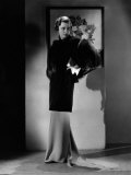 Irene Dunne  Modeling a Sapphire-Velvet Evening Coat Trimmed with Silver Fox  Early 1930s