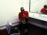 Ray Charles with His Alto Saxophone Backstage