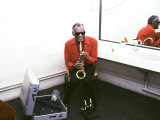 Ray Charles with His Alto Saxophone Backstage