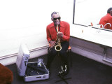 Ray Charles with His Alto Saxophone Backstage