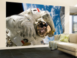An Astronaut Mission Specialist Participates in the Mission's Extravehicular Activity
