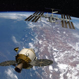 Rendering of the Orion space capsule and International Space Station