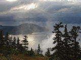 Rays of sunlight pierce the clouds hanging over Favorite Channel