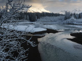 A storm clears along the Mendenhall River after a morning snow