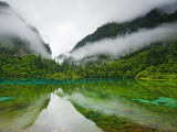 Mist Rolling over Five Colored Lake at Dawn