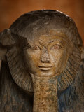 As a sphinx  Hatshepsut displays a lion's mane and a pharaoh's beard