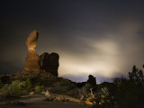 Balanced Rock basks in the glow of the town of Moab