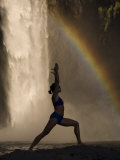 Young Woman Practicing Yoga on a Rock  Snoqualmie Falls  Washington State  USA