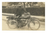 Black and White Photo of Man with Motorcycle